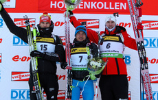 02.02.2012, Holmenkollen, Norway (NOR): (l-r) Arnd Peiffer (GER), Fischer, Salomon, OneWay, adidas, Evgeniy Garanichev (RUS), Madshus, Rottefella, Swix, adidas and Emil Hegle Svendsen (NOR), Madshus, Rottefella, Swix, Odlo - IBU world cup biathlon, sprin