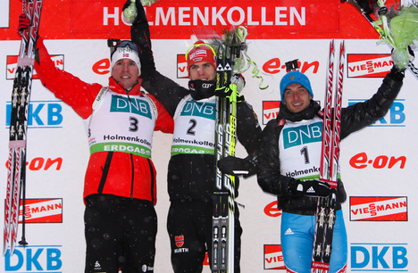 04.02.2012, Holmenkollen, Norway (NOR): (l-r) Emil Hegle Svendsen (NOR), Madshus, Rottefella, Swix, Odlo, Arnd Peiffer (GER), Fischer, Salomon, OneWay, adidas and Evgeniy Garanichev (RUS), Madshus, Rottefella, Swix, adidas - IBU world cup biathlon, pursu
