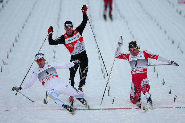02.01.2011, Oberstdorf, Germany (GER): in the men´s final (l-r) Emil Joensson (SWE), Fischer, Salomon, Craft, Dario Cologna (SUI), Fischer, Rottefella, Alpina, Swix, ODLO, Toko and Devon Kershaw (CAN), Fischer, Salomon, Swix - FIS world cup cross-countr NordicFocus