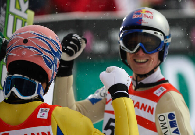 26.02.2011, Oslo, Norway (NOR): (r-l) the winner Thomas Morgenstern (AUT), Fischer was congratulated by his team mate Andreas Kofler (AUT), Fischer - FIS nordic world ski championships, ski jumping, individual HS106, Oslo (NOR). www.nordicfocus.com. © L