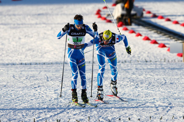 04.03.2011, Oslo, Norway (NOR): chance-over, (r-l) Sebastian Lacroix (FRA), Atomic, Salomon, One Way, Julbo and Maxime Laheurte (FRA), Fischer, Swix, Rottefella, One Way - FIS nordic world ski championships, nordic combined, team HS134/4x5km, Oslo (NOR) NordicFocus