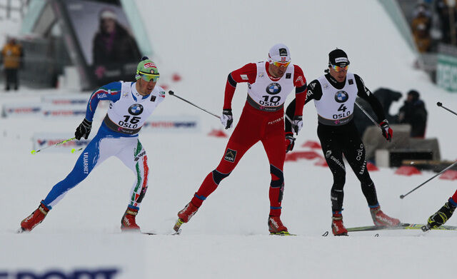24.02.2011, Oslo, Norway (NOR): (l-r) Federico Pellegrino (ITA), Skitrab, Alpina, One Way, Rottefella, Petter Northug (NOR), Fischer, Swix, Alpina, Rottefella, Skigo and Dario Cologna (SUI), Fischer, Swix, Alpina, Rottefella, ODLO, Casco, Toko - FIS nord