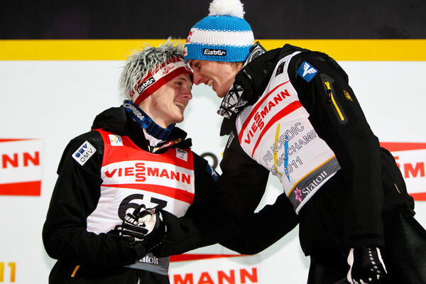 03.03.2011, Oslo, Norway (NOR): (l-r) Thomas Morgenstern (AUT), Fischer congratulates the winner Gregor Schlierenzauer (AUT), Fischer - FIS nordic world ski championships, ski jumping, individual HS134, Oslo (NOR). www.nordicfocus.com. © Laiho/NordicFoc NordicFocus
