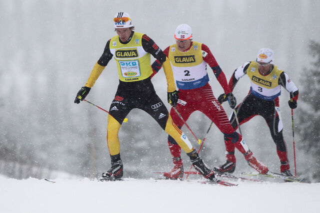 03.12.2011, Lillehammer, Norway (NOR): Tino Edelmann (GER), Madshus, Leki, Rottefella, Adidas followed by Haavard Klemetsen (NOR), Fischer, Swix and Christoph Bieler (AUT) - FIS world cup nordic combined, individual gundersen HS100/10km, Lillehammer (NOR
