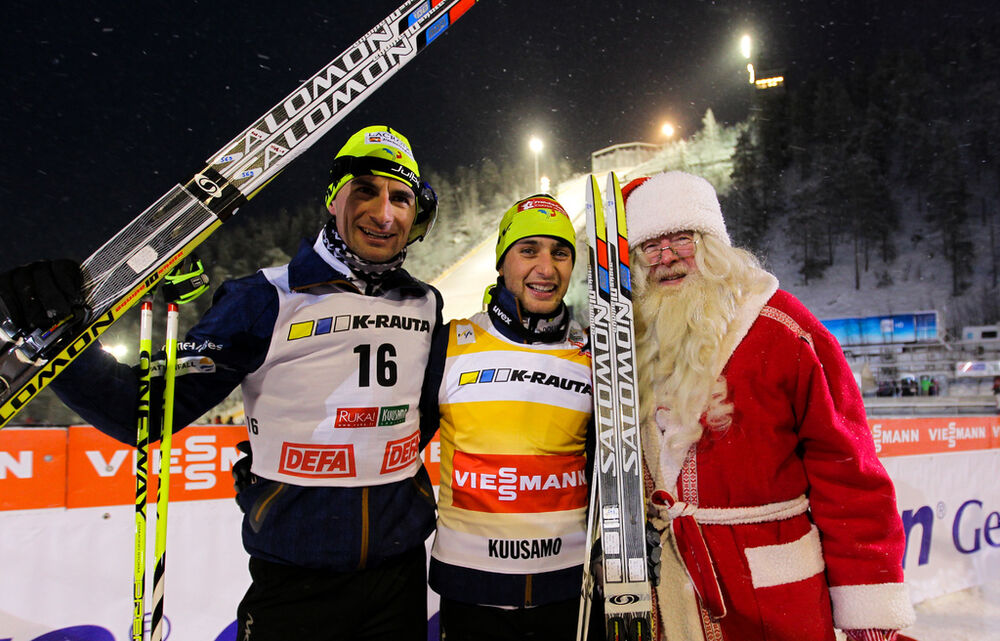 01.12.2012, Kuusamo, Finland (FIN): (l-r) Sebastian Lacroix (FRA), Atomic, Salomon, One Way and Jason Lamy Chappuis (FRA), Salomon, Swix, One Way and the Santa Claus - FIS world cup nordic combined, individual gundersen HS142/10km, Kuusamo (FIN). www.nor
