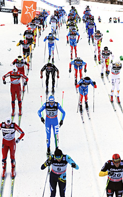 05.01.2013, Val di Fiemme, Italy (ITA): a big group takes the uphill- FIS world cup cross-country, tour de ski, mass men, Val di Fiemme (ITA). www.nordicfocus.com. © Felgenhauer/NordicFocus. Every downloaded picture is fee-liable.