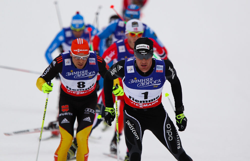 23.02.2013, Val di Fiemme, Italy (ITA): (l-r) Tobias Angerer (GER), Fischer, One Way, Rottefella, Adidas and Dario Cologna (SUI), Fischer, Swix, Alpina, Rottefella, Odlo - FIS nordic world ski championships, cross-country, skiathlon men, Val di Fiemme (I NordicFocus 23.02.2013, Val di Fiemme, Italy (ITA): (l-r) Tobias Angerer (GER), Fischer, One Way, Rottefella, Adidas and Dario Cologna (SUI), Fischer, Swix, Alpina, Rottefella, Odlo - FIS nordic world ski championships, cross-country, skiathlon men, Val di Fiemme (I