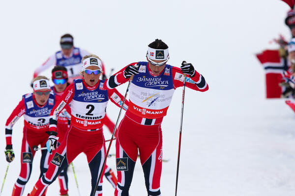 23.02.2013, Val di Fiemme, Italy (ITA): Marit Bjoergen (NOR), Fischer, Swix, Rottefella followed by Therese Johaug (NOR), Fischer, Swix, Salomon and Kristin Steira (NOR), Madshus, One Way, Salomon, Swix - FIS nordic world ski championships, cross-country NordicFocus