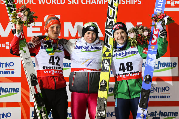 28.02.2013, Val di Fiemme, Italy (ITA): (l-r) Peter Prevc (SLO), Kamil Stoch (POL), Fischer and Anders Jacobsen (NOR), Fluege.de - FIS nordic world ski championships, ski jumping, individual HS134, Val di Fiemme (ITA). www.nordicfocus.com. © Laiho/Nordi NordicFocus