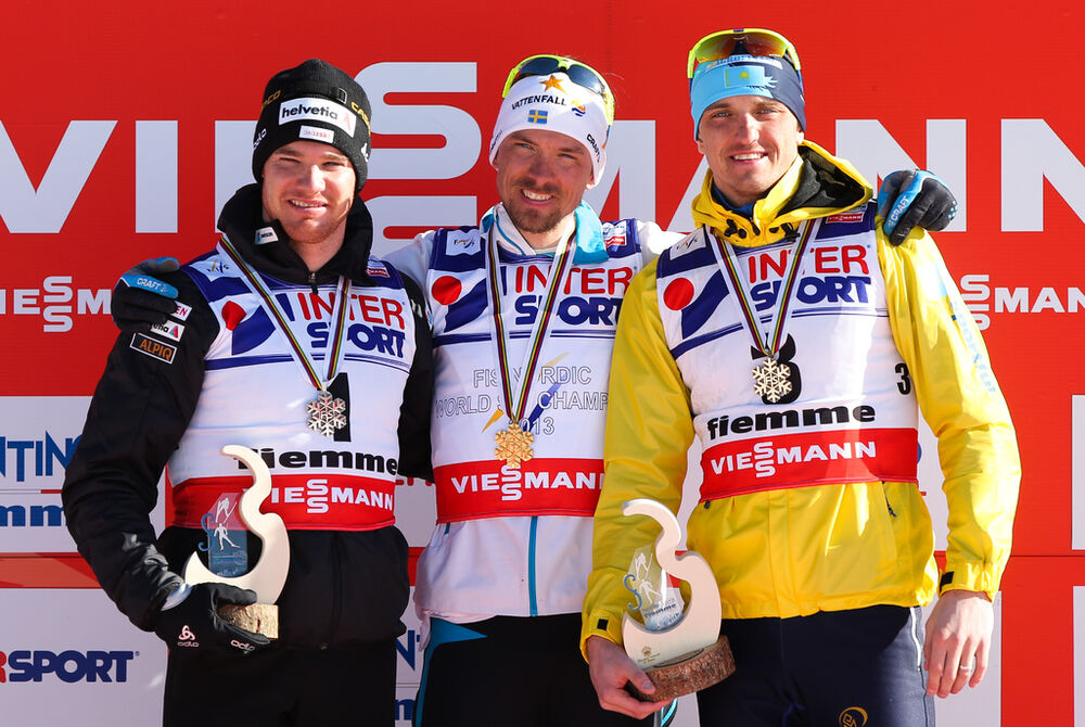 03.03.2013, Val di Fiemme, Italy (ITA): (l-r) Dario Cologna (SUI), Fischer, Swix, Alpina, Rottefella, Odlo, Johan Olsson (SWE), Fischer, Swix, Alpina, Rottefella, Craft and Alexey Poltoranin (KAZ), Fischer, Swix, Rottefella- FIS nordic world ski champion