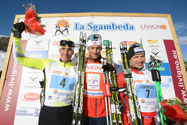 15.12.2013, Livigno, Italy (ITA): the podium, l-r: Petr Novak (CZE), Petter Northug (NOR), Ivanou Aliaksei (BLR) - FIS Marathon Cup La Sgambeda, Livigno (ITA). www.nordicfocus.com. © Rauschendorfer/NordicFocus. Every downloaded picture is fee-liable. NordicFocus