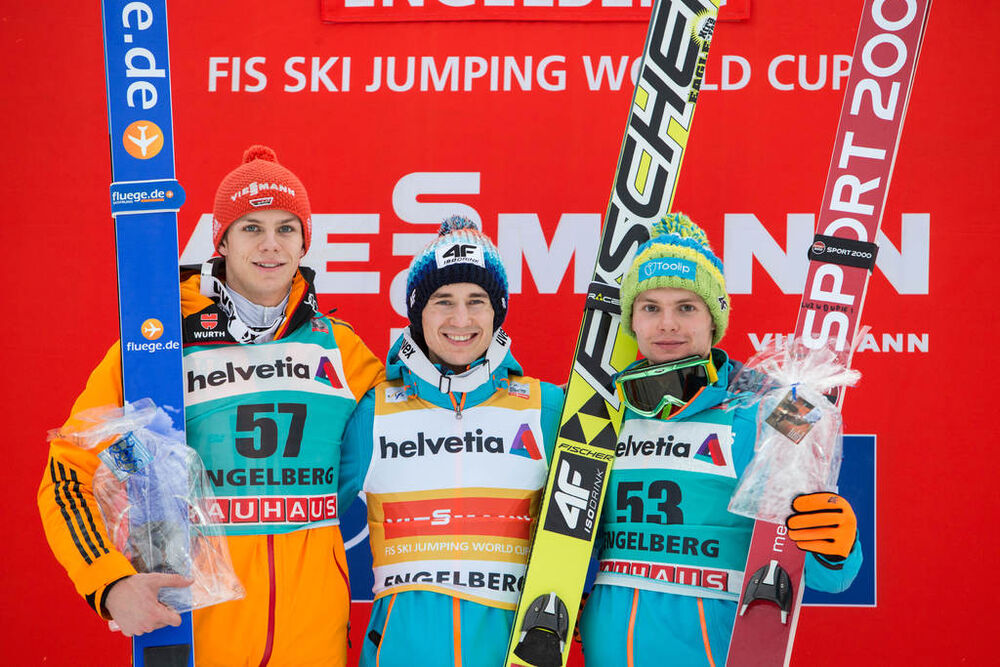 22.12.2013, Engelberg, Switzerland (SUI): Andreas Wellinger (GER), Kamil Stoch (POL), Jan Ziobro (POL) - FIS world cup ski jumping, individual HS137, Engelberg (SUI). www.nordicfocus.com. © Manzoni/NordicFocus. Every downloaded picture is fee-liable.