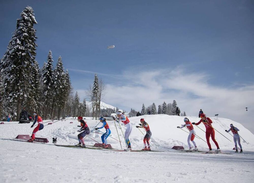 19.02.2014, Sochi, Russia (RUS): Ingvild Flugstad Oestberg (NOR), Sophie Caldwell (USA), - XXII. Olympic Winter Games Sochi 2014, cross-country, team sprint, Sochi (RUS). www.nordicfocus.com. © NordicFocus. Every downloaded picture is fee-liable.