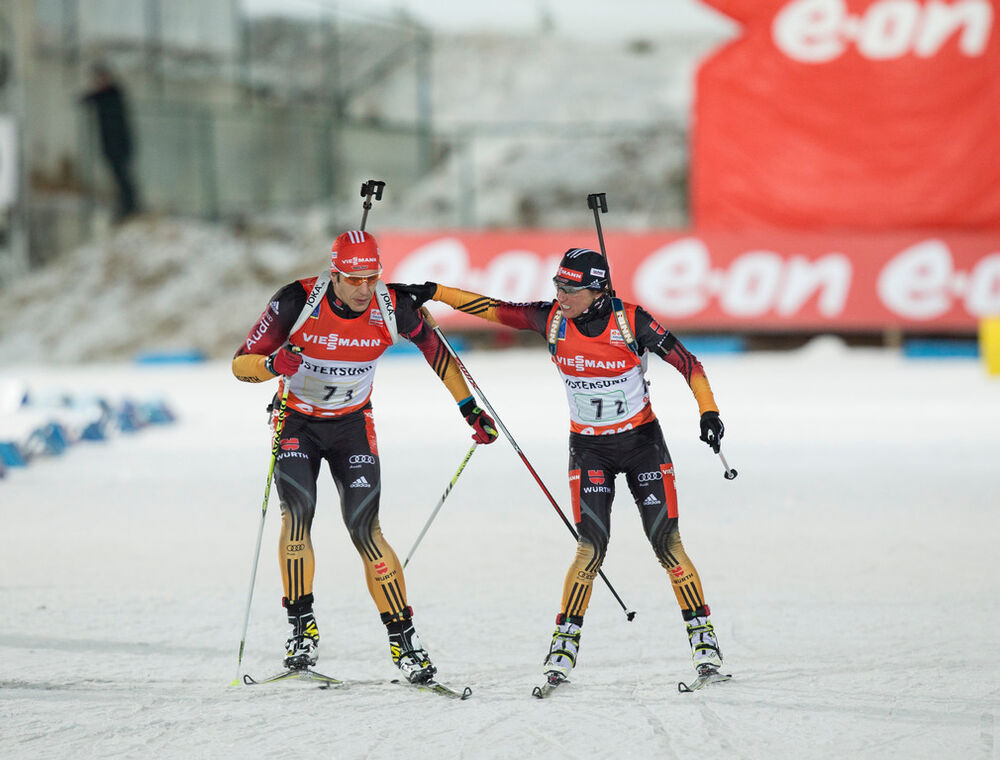 24.11.2013, Oestersund, Sweden (SWE): Arnd Peiffer (GER), Andrea Henkel (GER)- IBU world cup biathlon, relay mixed, Oestersund (SWE). www.nordicfocus.com. © Manzoni/NordicFocus. Every downloaded picture is fee-liable.