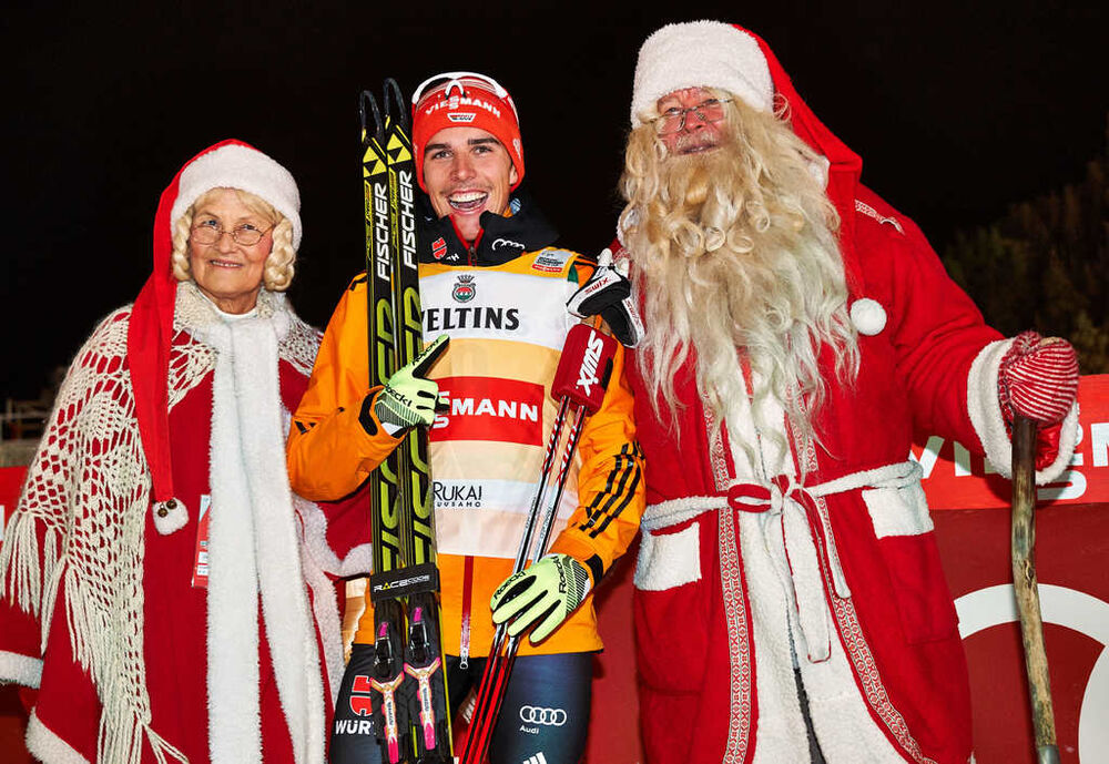 29.11.2014, Ruka, Finland (FIN): Johannes Rydzek (GER) and Santa Claus- FIS world cup nordic combined, individual gundersen HS142/10km, Ruka (FIN). www.nordicfocus.com. © Felgenhauer/NordicFocus. Every downloaded picture is fee-liable.