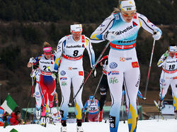 IDA INGEMARSDOTTER och Stina Nilsson - här som konkurrenter i Tour de Ski - bilder ett välbeprövat lag för Sverige i VM på söndag. Foto/rights: MARCELA HAVLOVA/sweski.com