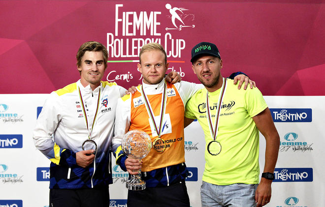 DUBBELT SVERIGE i herrarnas världscup. Robin Norum (mitten) vann före Victor Gustafsson (tv) och Rysslands Evgeniy Dementiev. Foto: NEWSPOWER.IT