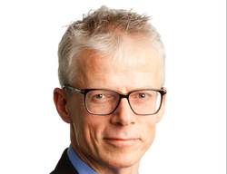 Bilde av Hans Christian Holte fra den gangen han var skattedirektør.