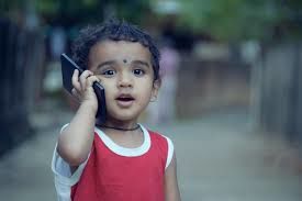 kid on cell phone
