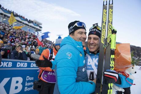NordicFocus 19.12.2019, Annecy-Le Grand Bornand, France (FRA):Patrick Favre (ITA), coach of team France, Quentin Fillon Maillet (FRA), (l-r) - IBU world cup biathlon, sprint men, Annecy-Le Grand Bornand (FRA). www.nordicfocus.com. © Manzoni/NordicFocus. Every down