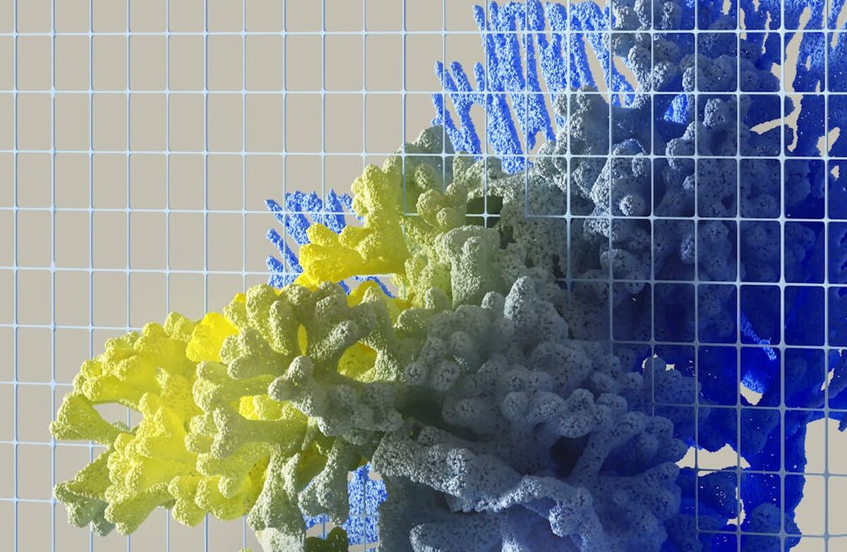 organisk materiale i blått og gult vokser ut av rutenettet