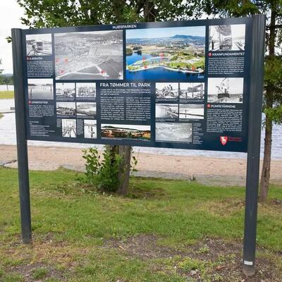 Infotavle om historie i Mjøsparken