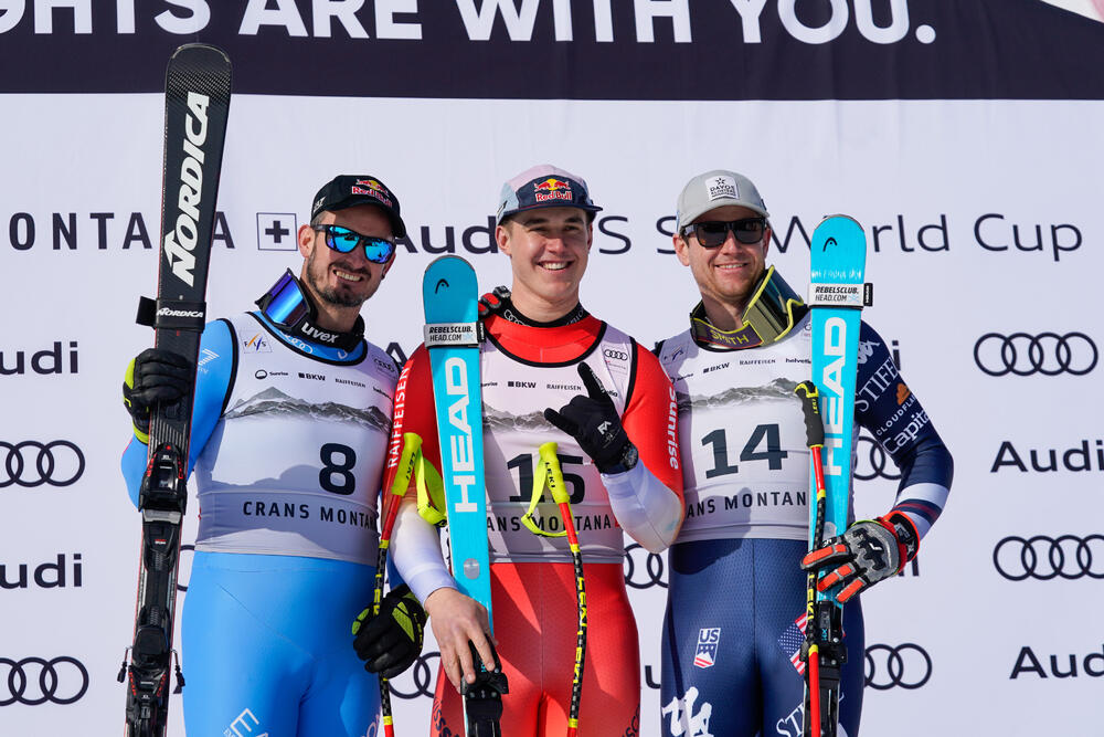 Podium descente Crans Montana
