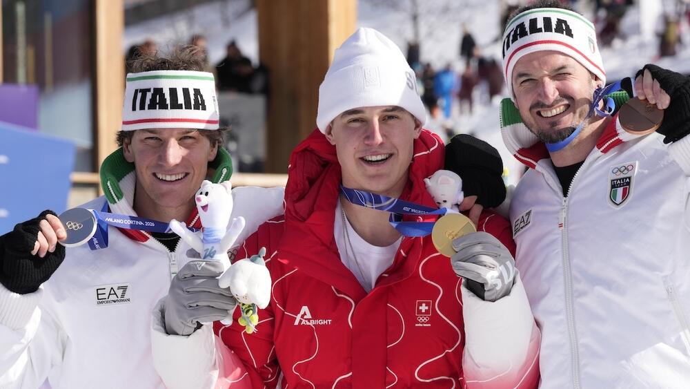Podium descente olympique 2026